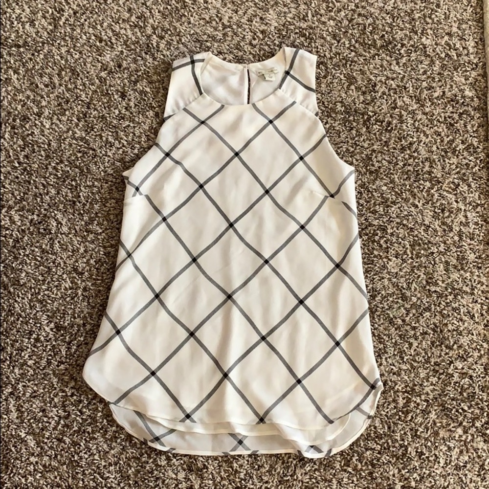 White & gray sleeveless blouse
